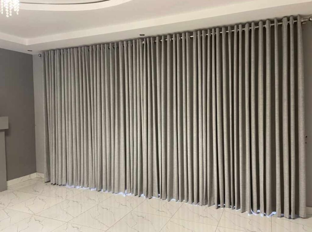 ceiling-drop-grey-eyelet-curtain ceiling-drop-grey-eyelet-curtain